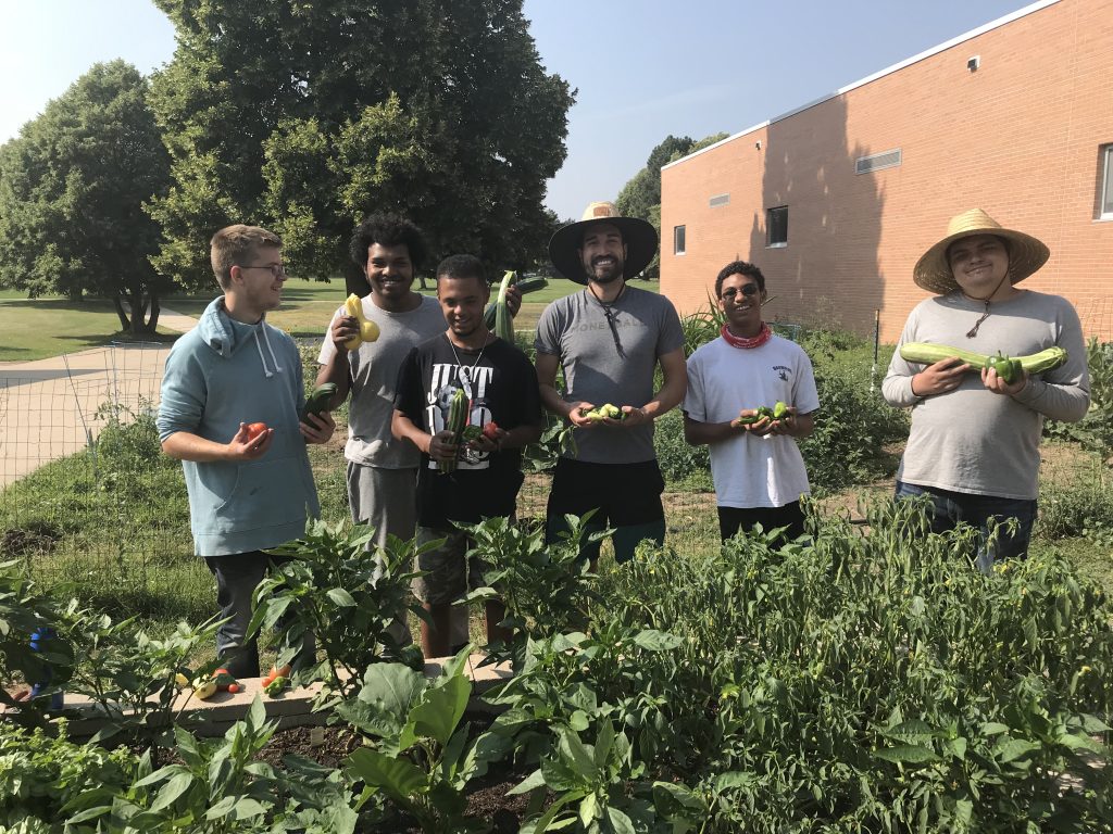 Garden of Youth interns at Thomas Jefferson HS and some of their produce.